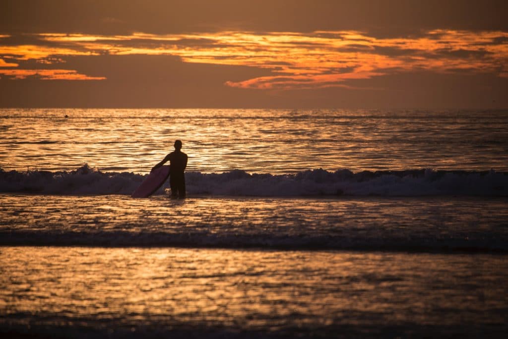 Surfer as sunset Chile