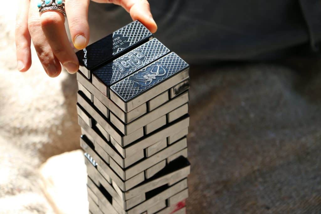 Jenga game on beach