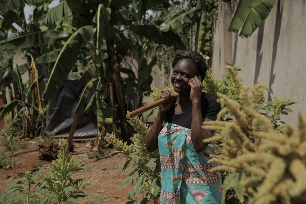 Farmer plays Wanji Games on the phone